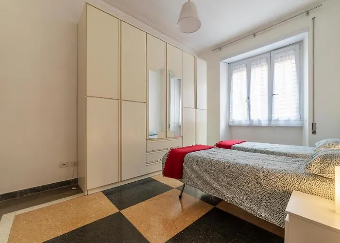 Guesthost - Piazza Bologna Apartment
